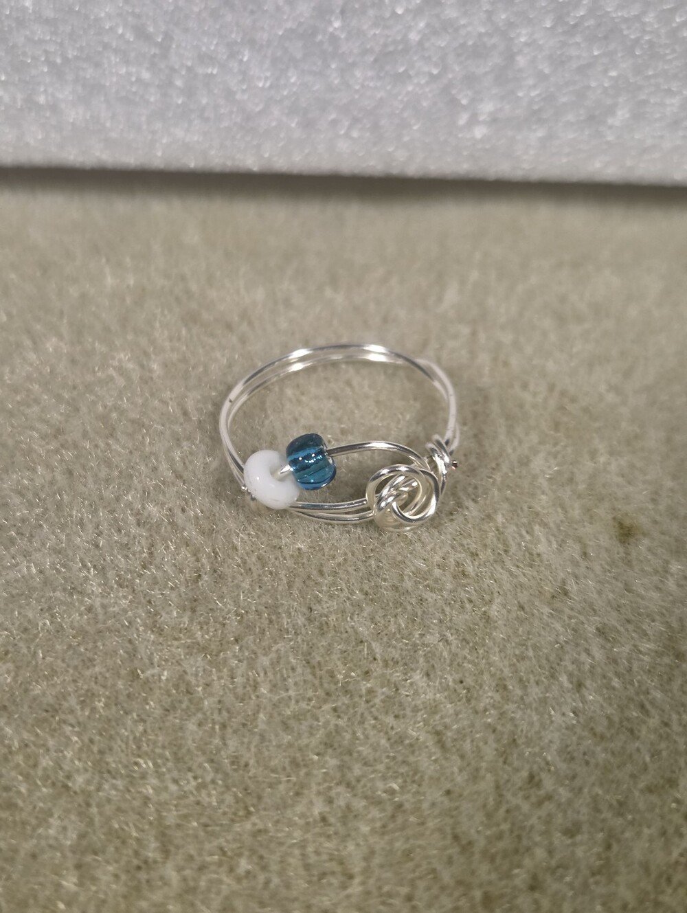Handcrafted Silver Wire Fidhet Ring with Teal and White Beads